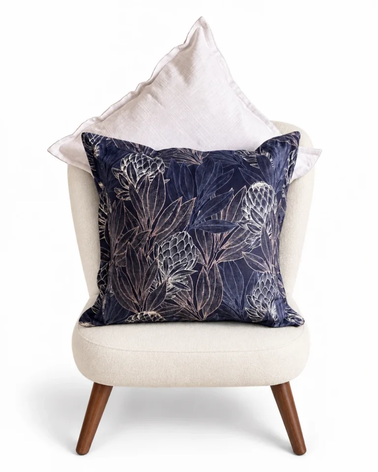 Midnight blue protea — Digitally styled ivory curved armchair on white