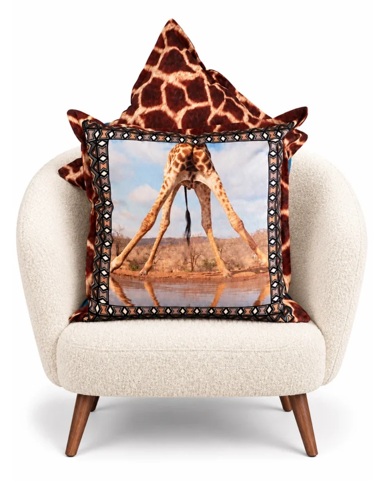 Dot dot boom giraffe — Digitally styled ivory curved armchair on white